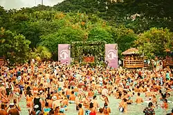 Crowd dancing during beach party in Labadee for Groove Cruise Miami 2025