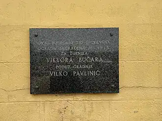 Slab on retaining wall