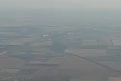 Krasnohvardiiske from the air from the south, Maryanivka is at the foreground