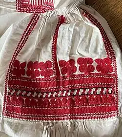 Fragment of an embroided shirt