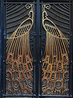 Wrought iron decorating a door. Marius BoyerMarius Boyer, 85 rue Colbert, 1929.[39]