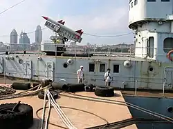 The forward HQ-61 SAM launcher.