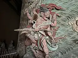 Yuan dynasty (1271-1368) figure of a Wisdom King, one out of a pair flanking a central figure of Guanyin, at Fusheng Temple[zh] in Yuncheng, Shanxi, China