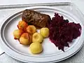 Rolada with silesian dumplings and red cabbage