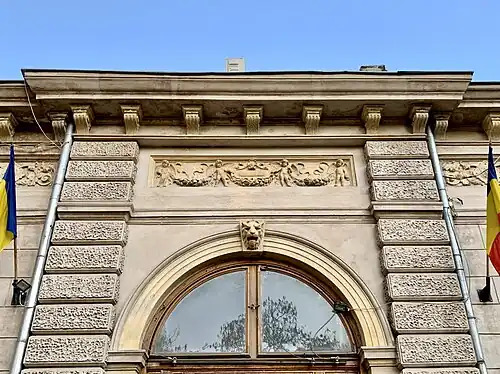 Neoclassical relief with putti and festoons on the Dimitrie Sturdza House (Strada Arthur Verona no. 13–15), Bucharest, Romania, unknown architect, 1883