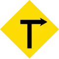 Right angle, local road to the left