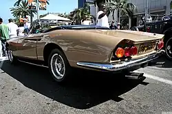 Earlier examples have triple, round taillights