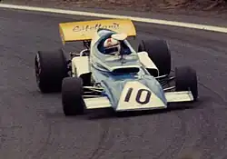 The Eifelland E21 (white accent, yellow spoiler variation) driven at the 1972 French Grand Prix