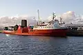 Renamed Orcadia, in the James Watt Dock, with MV Isle of Arran behind in the Garvel dry dock