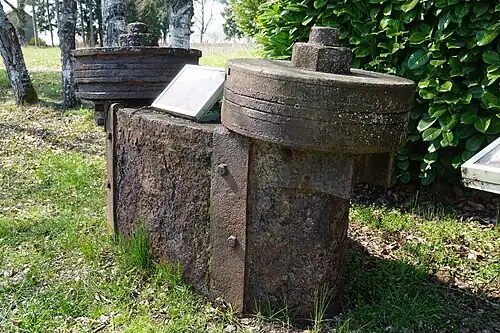 Counterweight used for lowering cages into the shaft.