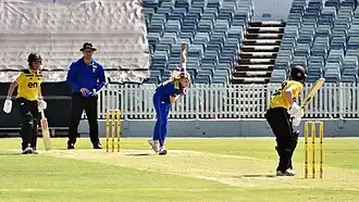 Former international Holly Ferling bowling for the ACT to WA captain Chloe Piparo at the WACA Ground, Perth, on 25 September 2022. The non-striker, Beth Mooney, was on her way to a player-of-the-match-winning 151*.