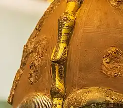 Central brow dragon heads on the Sutton Hoo helmet (613–635)