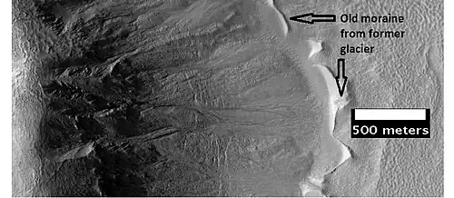 Gullies with remains of a former glacier in crater in Terra Sirenum, as seen by HiRISE under HiWish program