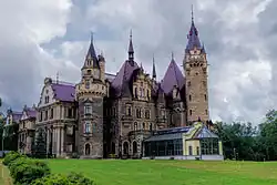Moszna Castle with an adjoining hothouse before cleaning