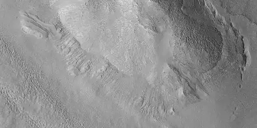Close view of dipping layers in Ismenius Lacus quadrangle, as seen by HiRISE under HiWish program
