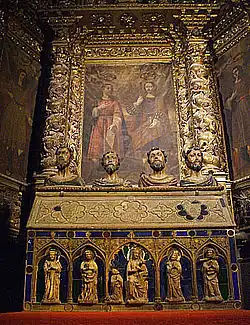 Chapel of the Holy Martyrs, with a stone 14th-century Gothic Casket of the Holy Martyrs of Girona in the foreground (the 4 busts on it date from 1659), and a Baroque retable from 1679 in the background