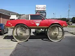 Oldsmobile Cutlass on 50-inch wire wheels, thought to be the largest size wheel ever fitted to a hi-riser