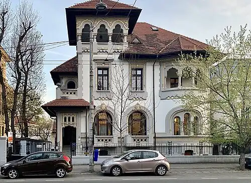 Romanian Revival - The C.N. Câmpeanu House on Bulevardul Dacia, Bucharest, Romania, c. 1923, by Constantin Nănescu[229]