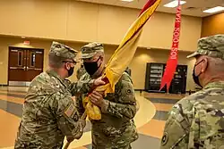 Passing the colors from one commander to another represents the passing of trust and well-being of the unit from one commander to another. Brig. Gen. John M. Dreska, commanding general, 311th Expeditionary Sustainment Command, passes the colors Col. David Nowicki during a change of command ceremony held on August 15, 2021.