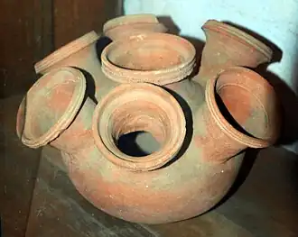 7 mouthed musical instrument pot