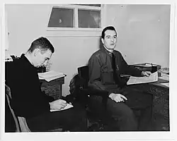 Y3c C. S. Foley (left) taking dictation from LCDR William P. Mack, NAS Adak, AK, 1943.