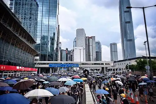 Protesters marching in the roads in Hong Kong Island