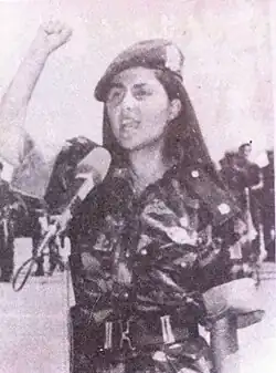 Female student performance in military uniform during a military ceremony of the Revolutionary Youth Union