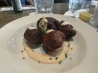 A plate of shrimp hushpuppies from Racks Fish House + Oyster Bar in Delray Beach, Florida.
