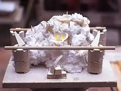 A sculpture by Patrick O'Hara propped up with ceramic wool for firing in the kiln