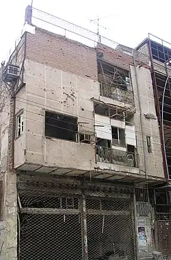 Ruins of a building in Abadan, which had suffered serious damages during the Iran–Iraq War (1980–88), including by Saddam's deadly chemical weapons