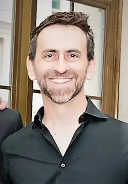 Adam Stein looking at the camera and smiling