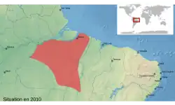 Map of northeastern Brazil, showing a highlighted range (in red) covering a roughly triangular area south of the lower reaches of the Amazon River