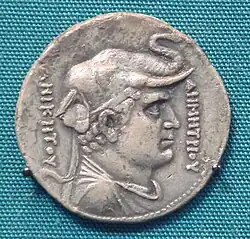 A pedigree coin of Agathocles for Demetrius I. The Greek legend reads: ΔΗΜΗΤΡΙΟΥ ΑΝΙΚΗΤΟΥ, Dēmētriou Anikētou, "Of Demetrius the Unconquered".