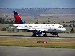 Image 48An Airbus A319 waits at Billings Logan International Airport. (from Transportation in Montana)