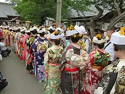 Procession of young women clad in kimono