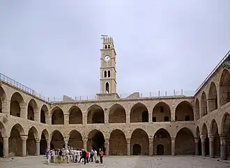 Khan al-Umdan in Acre, Israel (18th century, with clock tower added in 1906)[50]