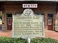 Historic marker at Newton Station.