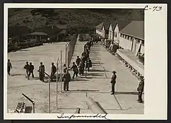 detainees marching out of camp