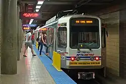 Passengers entering a subway train