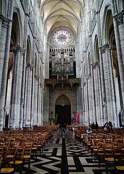 Nave of Classic Gothic, before 1235; Flamboyant rose window of 15th century