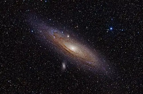 Image 20 Andromeda Galaxy Photo: Adam Evans The Andromeda Galaxy is a spiral galaxy approximately 2.5 million light-years away. The image, created using a hydrogen-alpha filter, also shows Messier objects 32 and 110, as well as NGC 206 and the star Nu Andromedae. On December 15, 1612, German astronomer Simon Marius became the first person to describe the galaxy using a telescope. More selected pictures