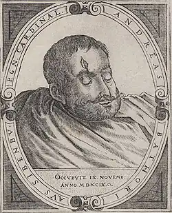 A head of a bearded man with a wound on his forehead