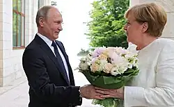 Putin held a meeting in Sochi with German chancellor Angela Merkel to discuss the Nord Stream 2 natural gas pipeline in May 2018.