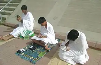 Pilgrims supplicating