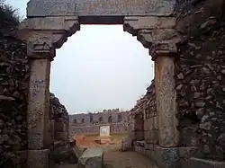 Walls, gate and bastions of Adilabad (Mohammadbad) and causeway leading to there from Tughlaqabad.