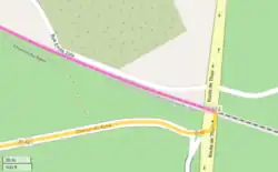 Area map of the crash site with routes of school bus (yellow line) and train (purple line) before collision.
