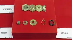 Cloisonne ornaments, coffin fittings, glass beads Displayed at the Asuka Village Buried Cultural Property Exhibition Room