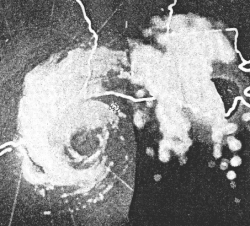 A black and white radar image of a hurricane. A definitive eye is clearly seen.
