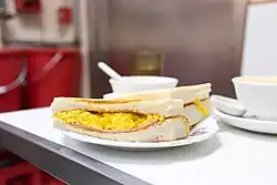 A ham and scrambled egg sandwich.