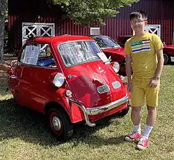 BMW Isetta 300, next to a 167-centimetre (5 ft 6 in) young man